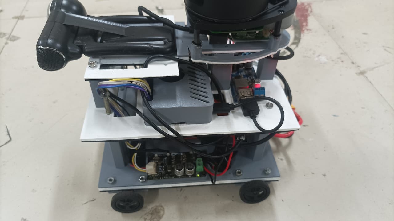 Three-quarter view showing the Raspberry Pi, wiring loom, battery and XT60 connector.