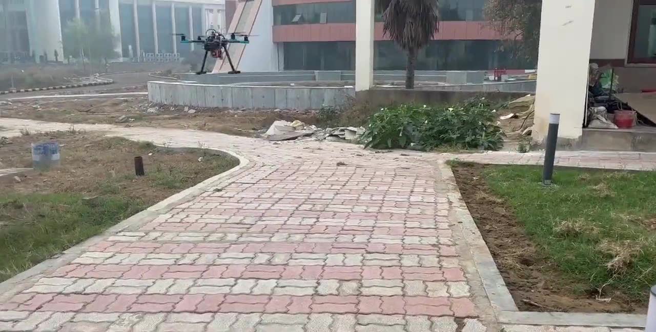 A quadcopter in a campus flight test